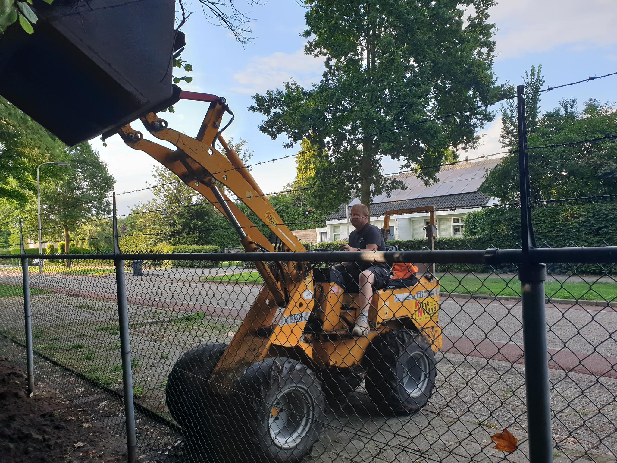 Bult zand kopje kleiner gemaakt